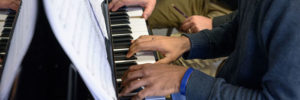 An adult piano student extends learning to include other group programs.