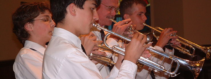 Trumpet students perform a quartet.